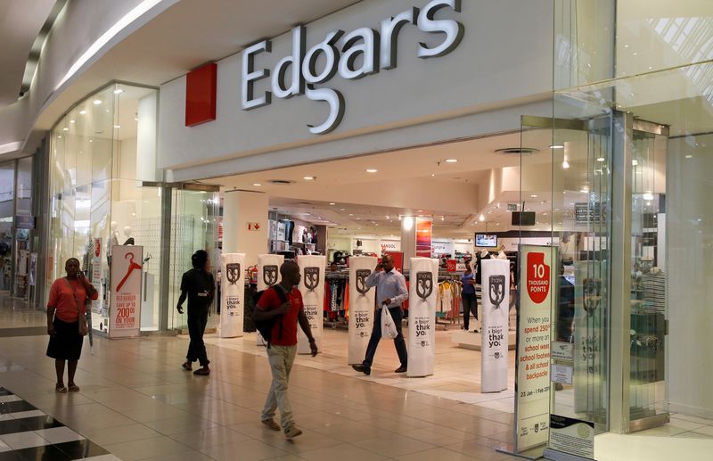 &copy; Reuters. FILE PHOTO: Shoppers walk past an Edgars store at a shopping centre in Soweto, southwest of Johannesburg