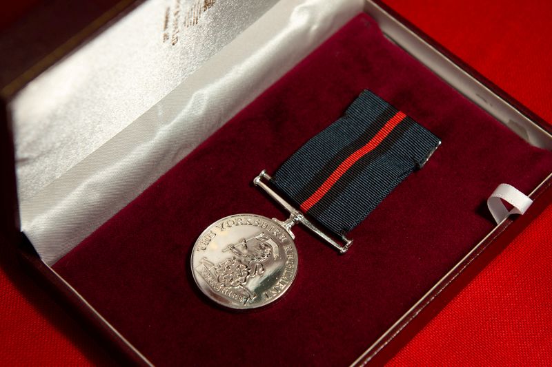 &copy; Reuters. The Yorkshire Regiment medal presented to Former British Army Officer Captain Tom Moore, appointed the first Honorary Colonel of the Army Foundation College in Harrogate, is pictured in Bedford