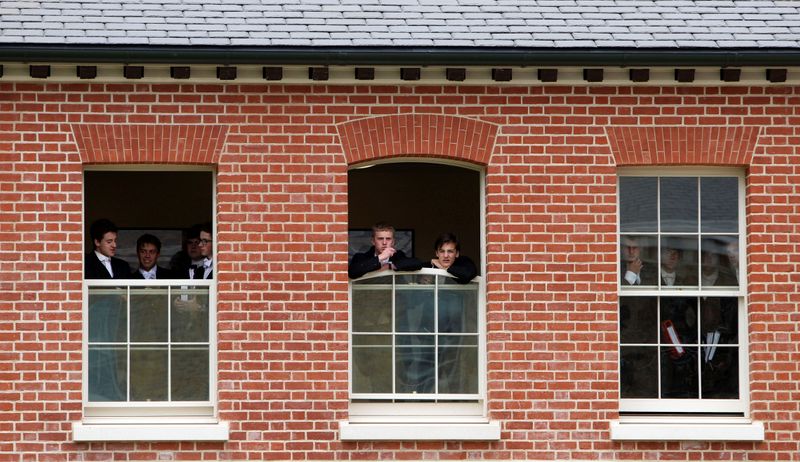 &copy; Reuters. FILE PHOTO: Pupils watch during the visit by Britain&apos;s Prince Charles to open the new Bekynton Field Development building at Eton College near Windsor