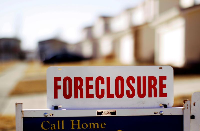 &copy; Reuters. FILE PHOTO: The sign for a foreclosed house for sale sits at the property in Denver