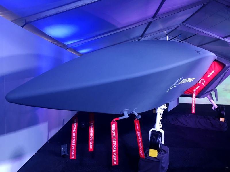 © Reuters. FILE PHOTO: A model of Boeing's new unmanned, fighter-like jet is displayed in Avalon