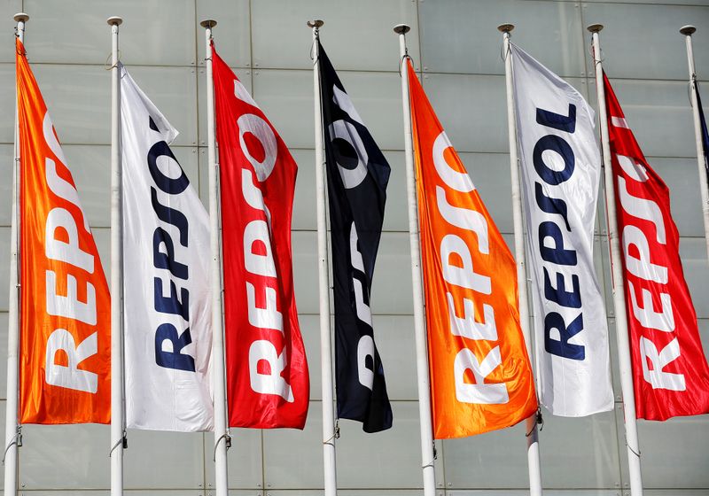 &copy; Reuters. FILE PHOTO: Repsol flags are seen at a conference hall during the company&apos;s annual shareholders meeting in Madrid