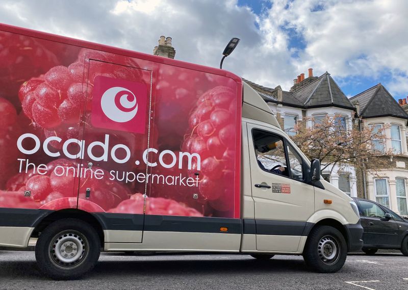&copy; Reuters. FILE PHOTO: An Ocado delivery van is driven along a road in Hackney, London