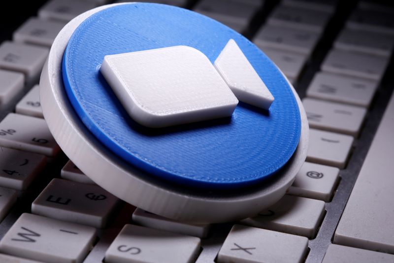 &copy; Reuters. A 3D printed Zoom logo is placed on the keyboard in this illustration taken