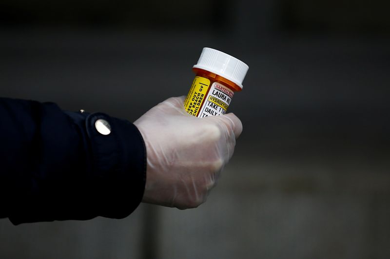 &copy; Reuters. FILE PHOTO:  Laura Ng is pictured with her hydroxychloroquine prescription during the coronavirus disease (COVID-19) outbreak in Seattle
