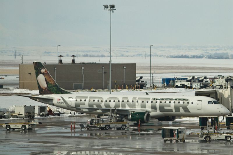 &copy; Reuters. A Frontier Airlines jet waits at the gate prior to departure at the Denver International Airport in Denver