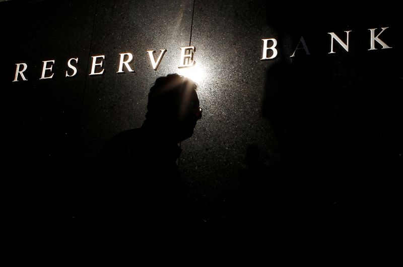 &copy; Reuters. A pedestrian walks past the Reserve Bank of Australia building in central Sydney