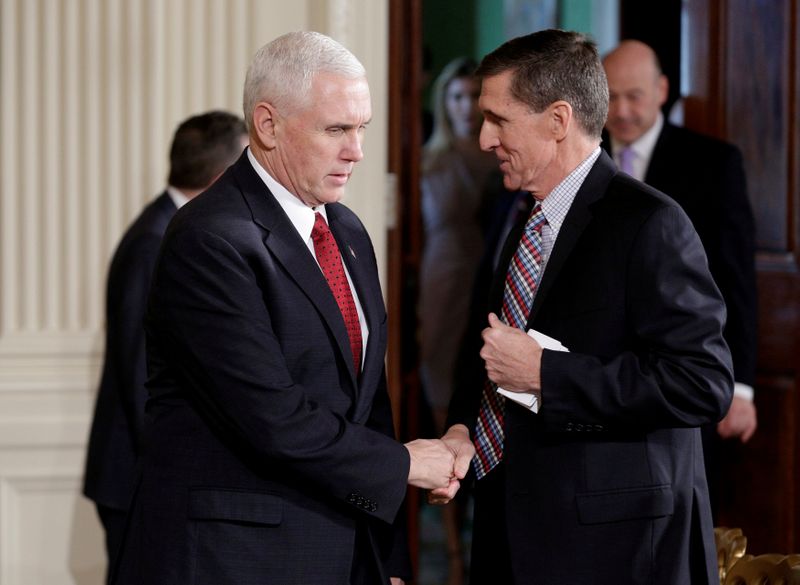 &copy; Reuters. FILE PHOTO: U.S. Vice President Pence greets National Security Adviser Flynn before Abe-Trump news conference at the White House in Washington.