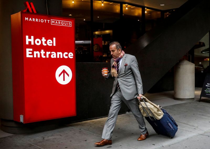 &copy; Reuters. A guest arrives at the Marriott Marquis hotel in Times Square in New York