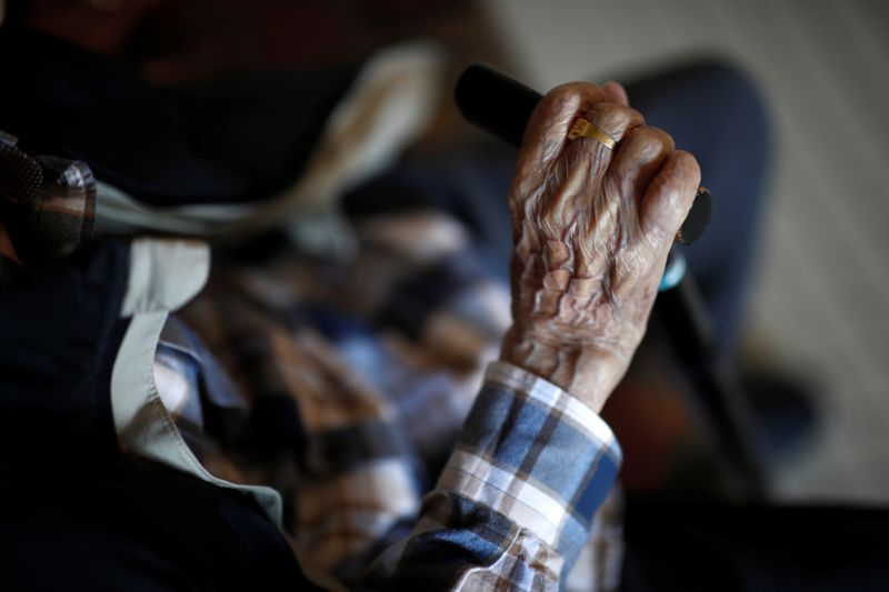 &copy; Reuters. A resident is seen with a walking stick at the Emile Gerard retirement home (EHPAD - Housing Establishment for Dependant Elderly People) in Livry-Gargan