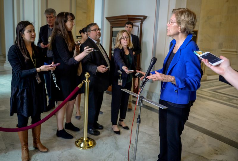 &copy; Reuters. FILE PHOTO: Warren speaks to media after a meeting in the Kennedy Caucus room to wrap up work on coronavirus economic aid legislation