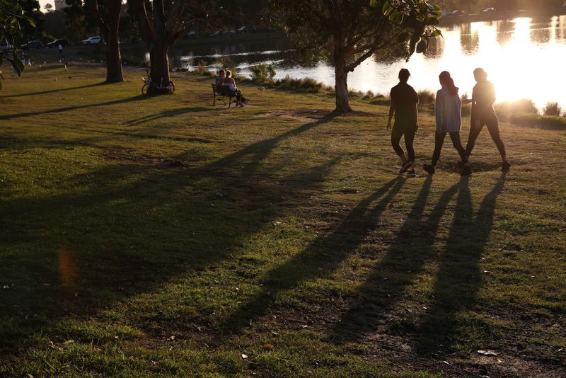 &copy; Reuters. People exercise in Centennial Park in Sydney