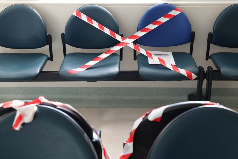 &copy; Reuters. FILE PHOTO: Seats are marked off for social distancing at Westmead Hospital in Sydney
