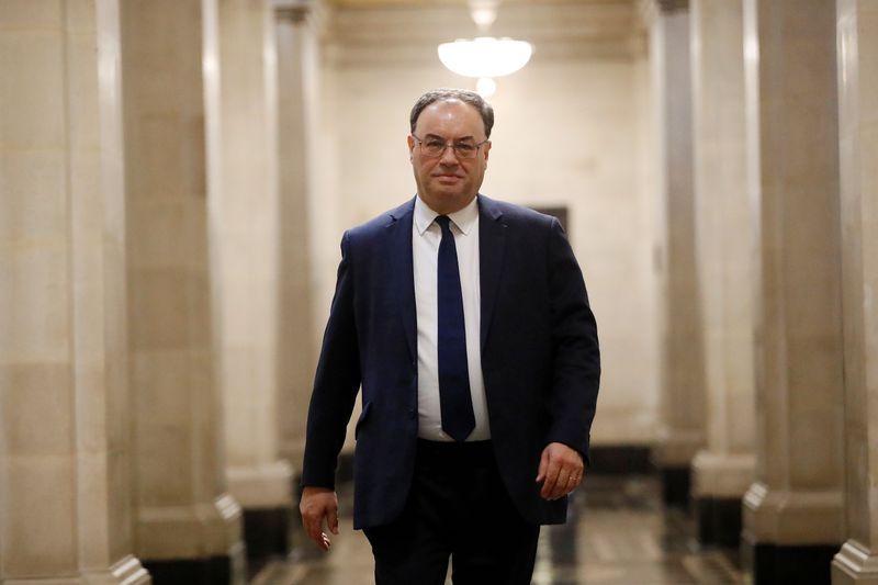 &copy; Reuters. Bank of England Governor Andrew Bailey poses for a photograph on the first day of his new role at the Central Bank in London