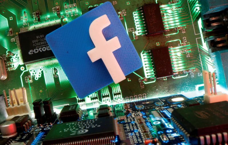 &copy; Reuters. FILE PHOTO: Facebook symbol is seen on a motherboard in this picture illustration
