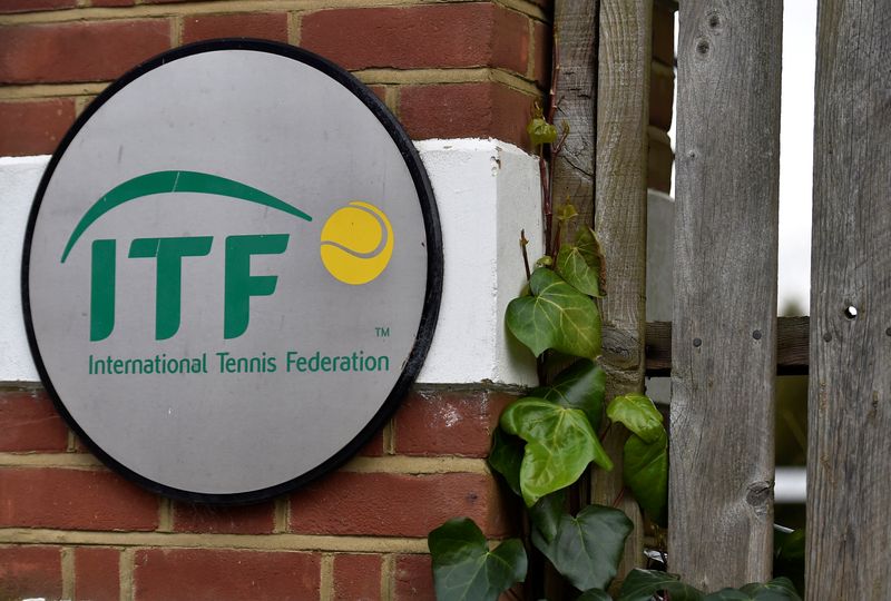 © Reuters. FILE PHOTO: A logo is seen at the entrance to the International Tennis Federation headquarters in London