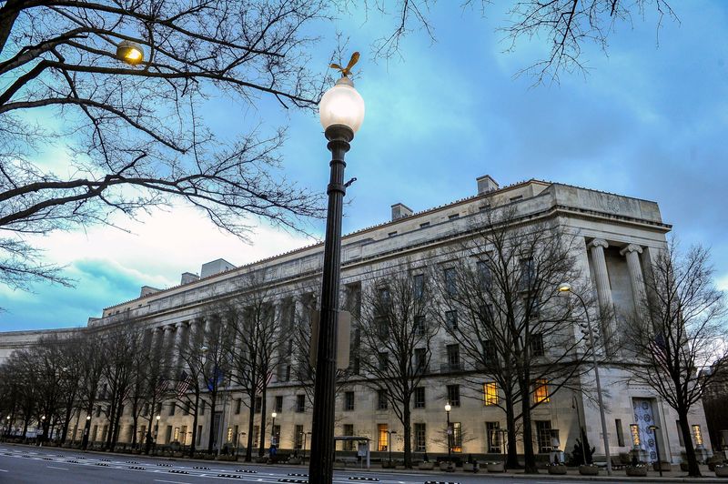 &copy; Reuters. FILE PHOTO: The U.S. Department of Justice building is bathed in morning light at sunrise in Washington