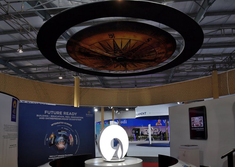 &copy; Reuters. The logo of Reliance Industries is pictured in a stall at the Vibrant Gujarat Global Trade Show at Gandhinagar