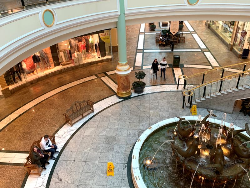 &copy; Reuters. FILE PHOTO: Shoppers are seen inside a near deserted Intu Trafford Centre in Manchester