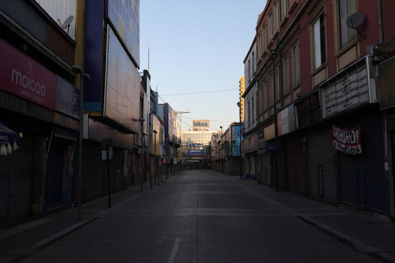 &copy; Reuters. FILE PHOTO:  An empty street in a commercial sector of Santiago, during a preventive quarantine following the outbreak of coronavirus disease (COVID-19)