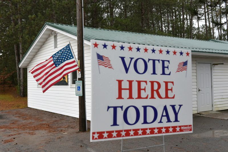 &copy; Reuters. Voting sign is seen outside The Rock Dam Rod and Gun Club, which serves as the polling place for 96 voters during the midterm election, in Foster Township, Wisconsin