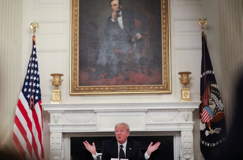 &copy; Reuters. U.S. President Donald Trump talks about taking hydroxychloroquine at coronavirus response event with restaurant executives at White House in Washington