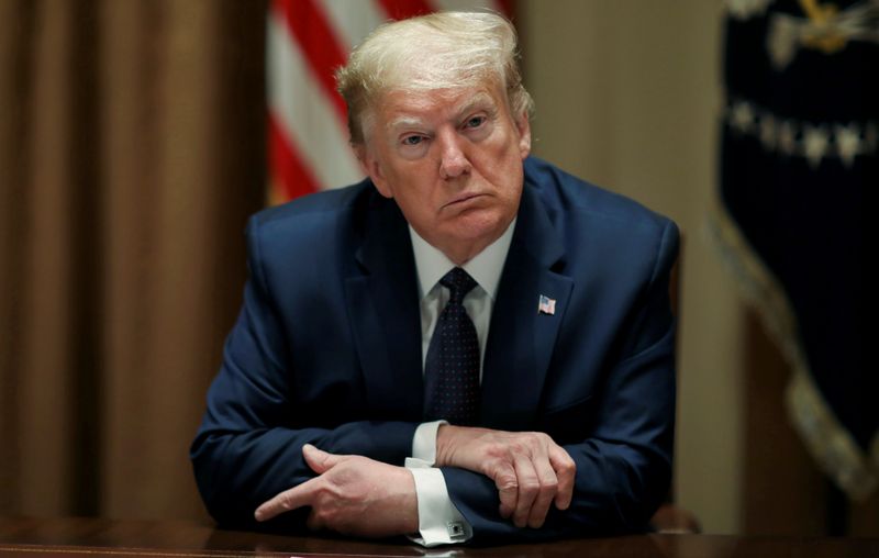 &copy; Reuters. FILE PHOTO: U.S. President Donald Trump holds meeting on economic  &quot;opportunity zones&quot; in Cabinet Room of the White House in Washington