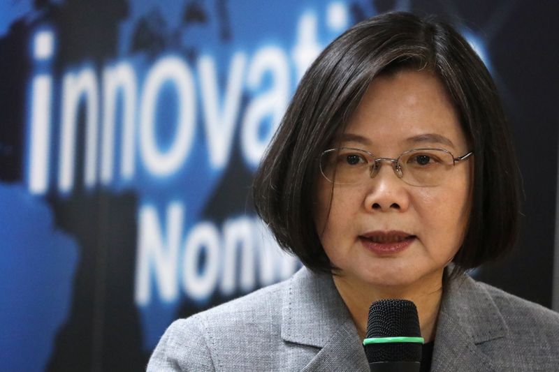 &copy; Reuters. FILE PHOTO:  Taiwanese president Tsai Ing-Wen speaks at a non woven filter fabric factory, where the fabric is used to make surgical face masks, in Taoyuan