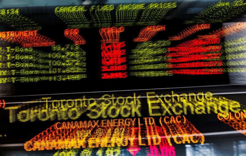 &copy; Reuters. FILE PHOTO:  A sign board displaying Toronto Stock Exchange stock information is seen in Toronto