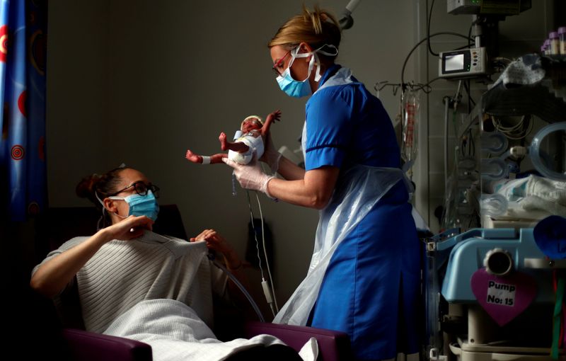 &copy; Reuters. A Picture and its Story: How photographer captured baby image in coronavirus lockdown