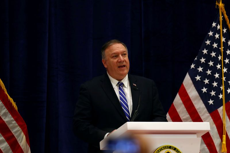 © Reuters. FILE PHOTO: U.S. Secretary of State Mike Pompeo speaks during a news conference after a signing ceremony between members of Afghanistan's Taliban delegation and U.S. officials in Doha