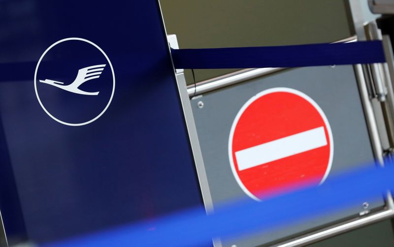 &copy; Reuters. Logo of German airlines Lufthansa is pictured next to a no-entry sign at Frankfurt Airport