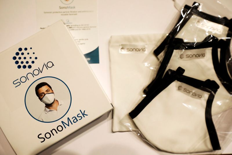 © Reuters. Packaging of Israel's Sonovia Ltd's washable and reusable antiviral masks is displayed in Ramat Gan
