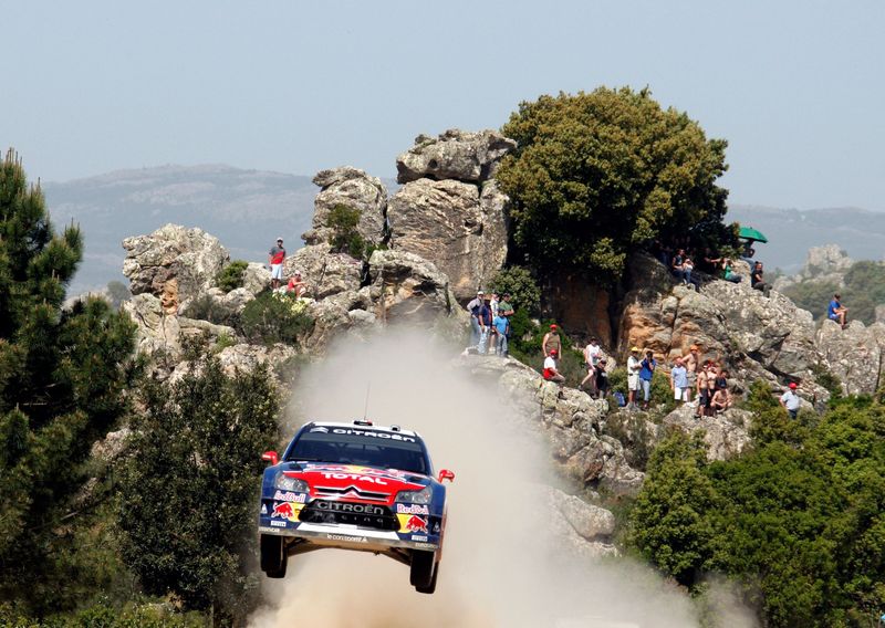 &copy; Reuters. FILE PHOTO: France&apos;s Sebastien Loeb goes airborne with his Citroen C4 during the Crastazza stage on the second day of the WRC Rally Italy in Sardinia
