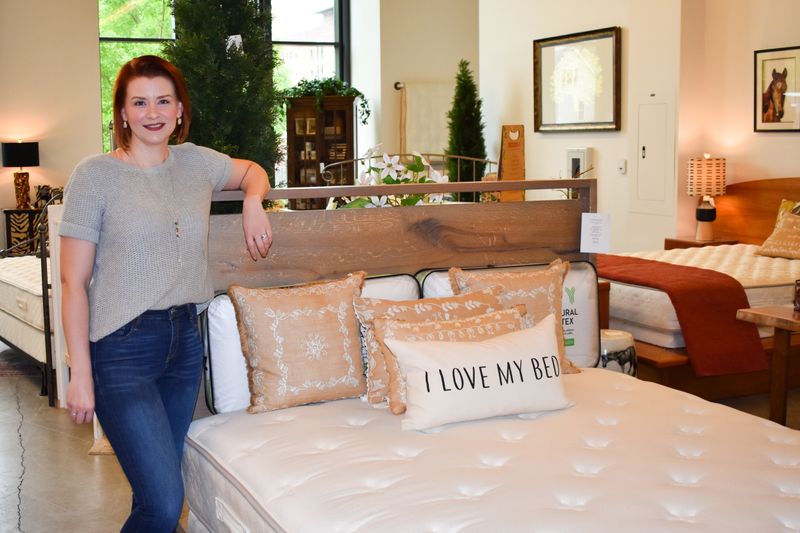 &copy; Reuters. Lauren Taylor poses for a photo in a Holder Mattress store