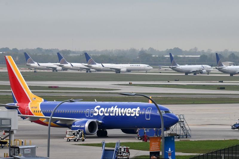 &copy; Reuters. FILE PHOTO:  A Southwest Airlines Boeing 737 MAX 8 aircraft is pictured in front of United Airlines planes, including Boeing 737 MAX 9 models, at William P. Hobby Airport in Houston