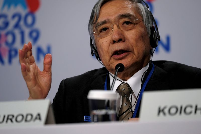 &copy; Reuters. FILE PHOTO: Bank of Japan Governor Haruhiko Kuroda takes questions from reporters at the annual meetings of the International Monetary Fund and World Bank in Washington