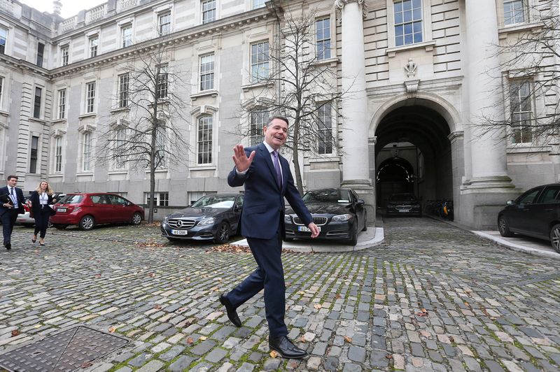 &copy; Reuters. FILE PHOTO: Irish Finance Minister Paschal Donohoe walks outside Government Buildings in Dublin