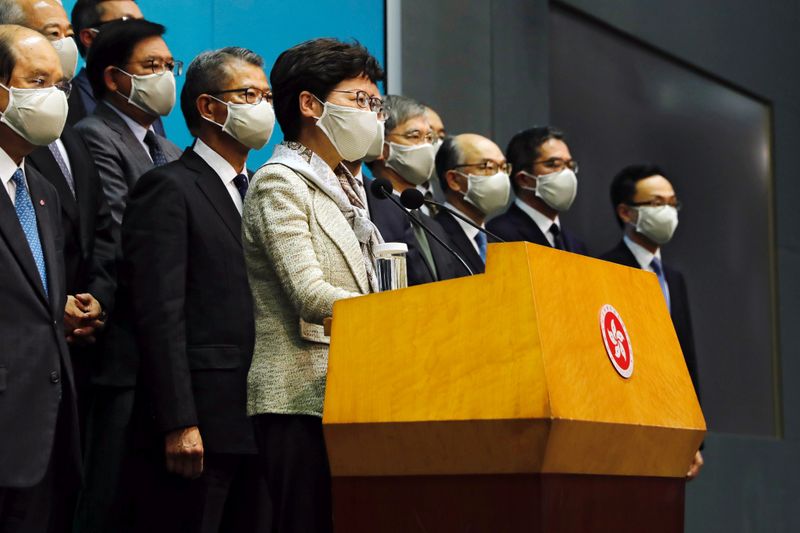 &copy; Reuters. Hong Kong Chief Executive Carrie Lam, wearing a face mask following the coronavirus disease (COVID-19) outbreak, attends a news conference with officers over Beijing’s plans to impose national security legislation in Hong Kong