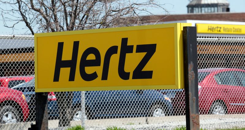&copy; Reuters. FILE PHOTO: A Hertz rental car sign is placed outside a rental lot near Detroit Metropolitan airport in Romulus