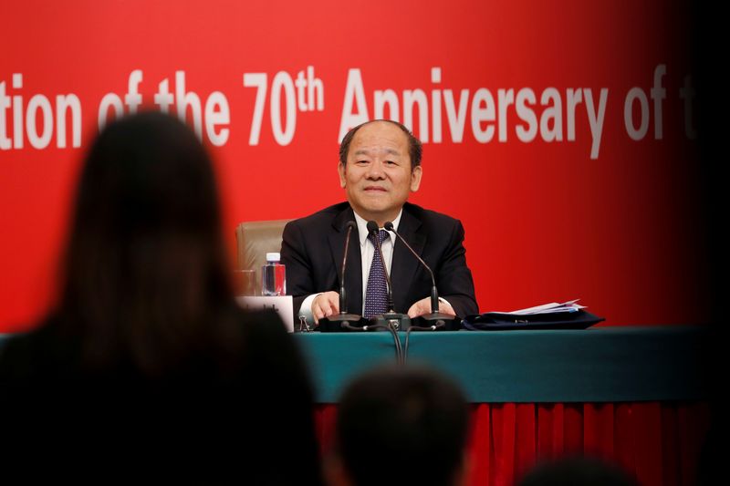 &copy; Reuters. FILE PHOTO: NDRC Vice Chairman Ning Jizhe attends a news conference on China&apos;s economic development ahead of the 70th anniversary of its founding, in Beijing