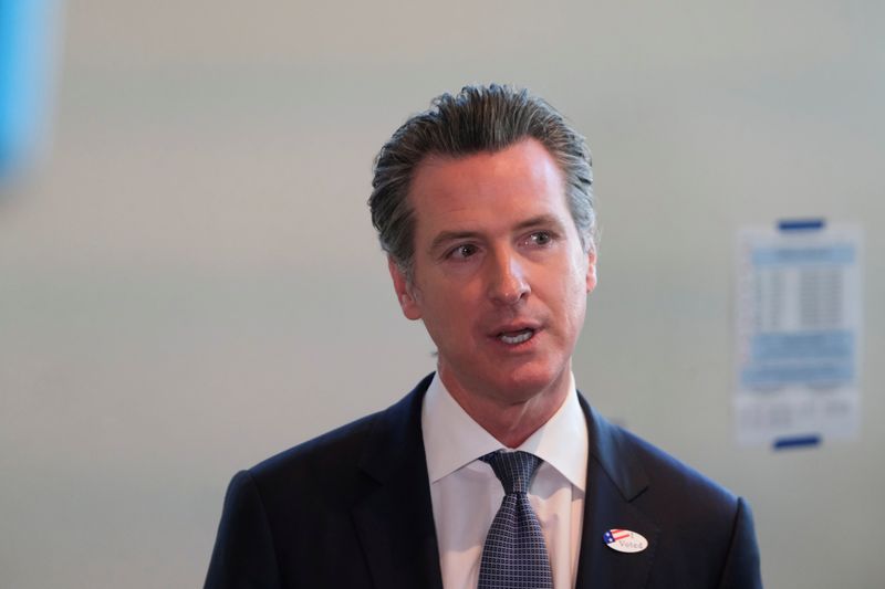 &copy; Reuters. FILE PHOTO: California&apos;s Governor Gavin Newsom speaks to the media after casting his vote at a voting center at The California Museum for the presidential primaries on Super Tuesday in Sacramento