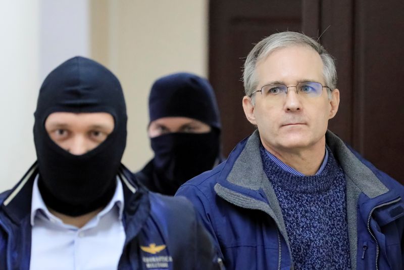 &copy; Reuters. FILE PHOTO: Former U.S. Marine Paul Whelan, who was detained and accused of espionage, is escorted inside a court building in Moscow