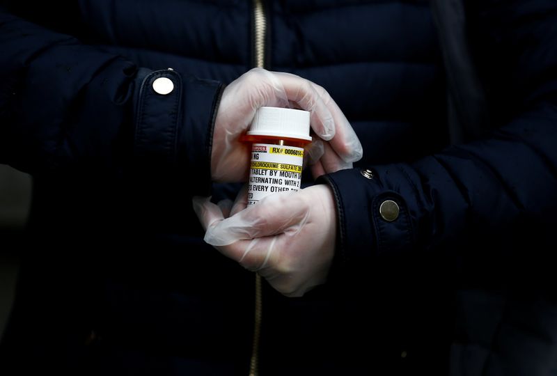 &copy; Reuters. FILE PHOTO:  Laura Ng is pictured with her hydroxychloroquine prescription during the coronavirus disease (COVID-19) outbreak in Seattle