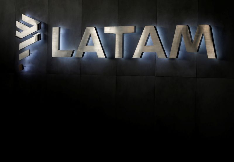 &copy; Reuters. LATAM airlines logo, is seen inside of the Commodore Arturo Merino Benitez International Airport in Santiago
