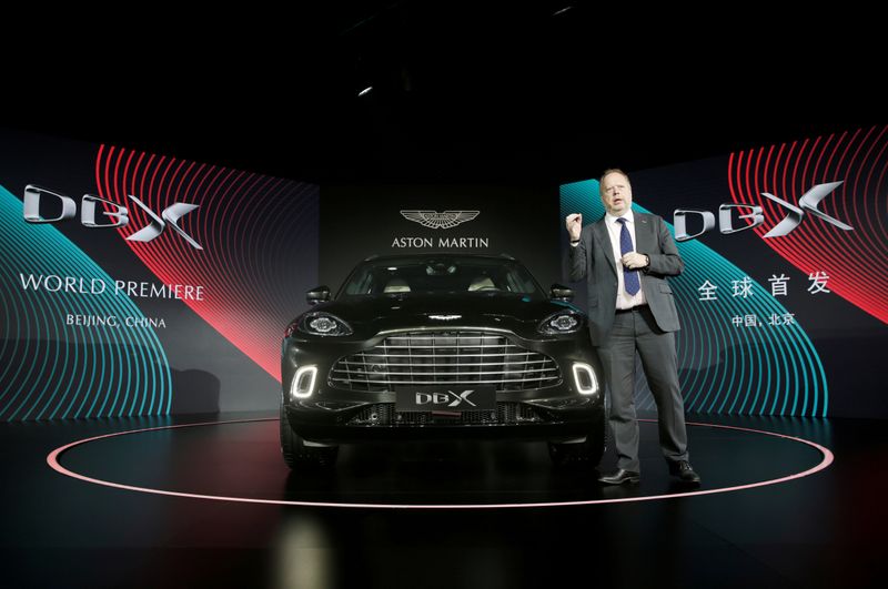 © Reuters. FILE PHOTO: CEO of Aston Martin Andy Palmer attends a global launch ceremony of its first sport utility vehicle Aston Martin DBX in Beijing