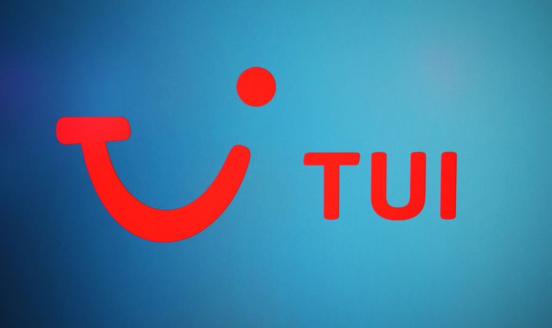 &copy; Reuters. The TUI logo is displayed on a computer screen in London
