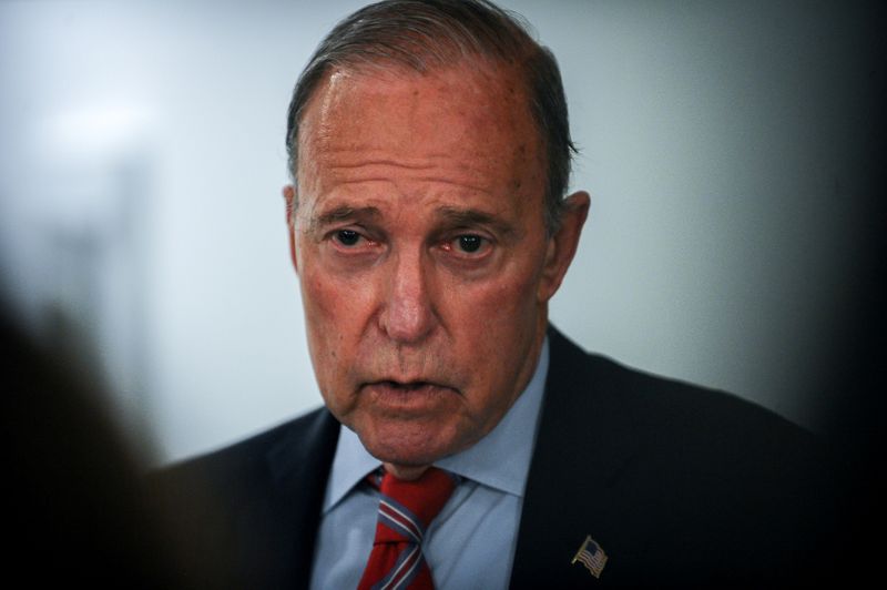 &copy; Reuters. White House National Economic Council Director Larry Kudlow talks with media during a break in a meeting to wrap up work on coronavirus economic aid legislation