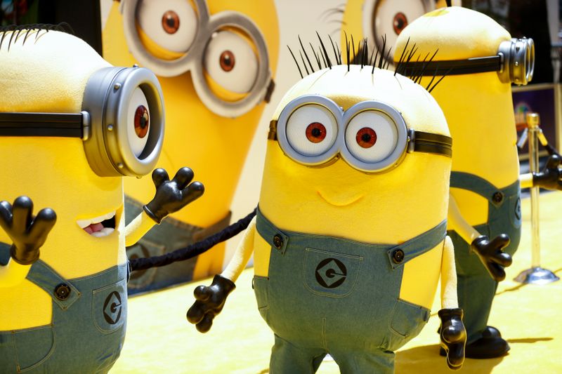 © Reuters. Minion characters pose at the American premiere of 