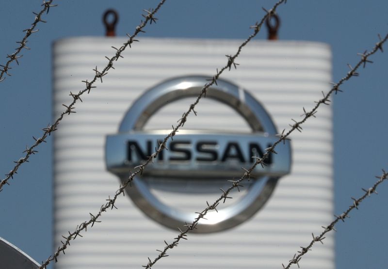 &copy; Reuters. The logo of Nissan is seen through a fence at Nissan factory at Zona Franca during the coronavirus disease (COVID-19) outbreak in Barcelona